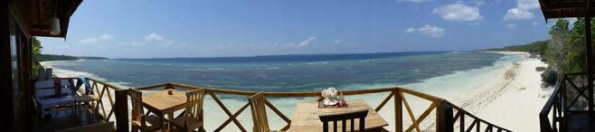 A panoramic view of both beaches at Bara from Cosmos Bungalow's communal terrace